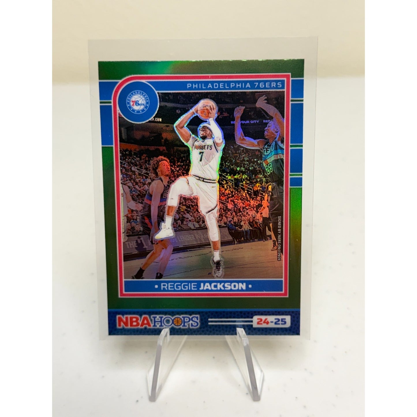 2024-25 Panini NBA Hoops Premium Green Prizm Reggie Jackson #53